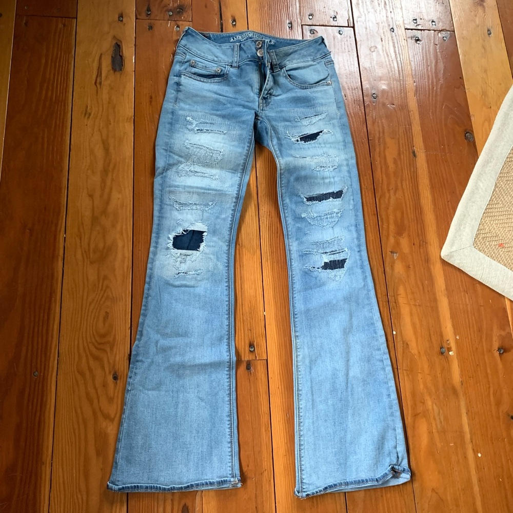 American Eagle 2 artist flare bell bottom distressed patchwork jeans holes boho